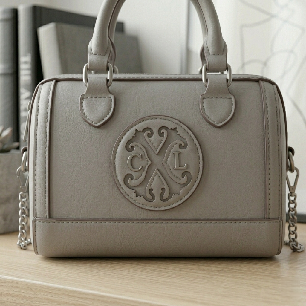 CXL by Christian Lacroix Taupe Faux Leather Barrel Satchel with Embossed Logo