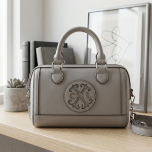 CXL by Christian Lacroix Taupe Faux Leather Barrel Satchel with Embossed Logo